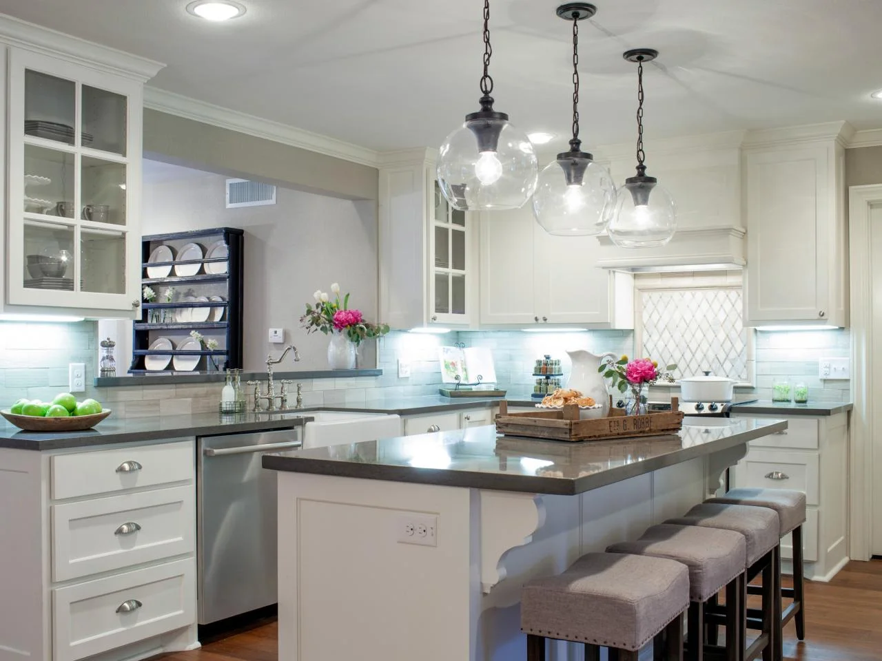 Completed Decoriam kitchen remodel with custom cabinetry and stone surfaces